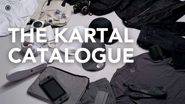 The Kartal Catalogue cover with caps, clothing and accessories laid flat